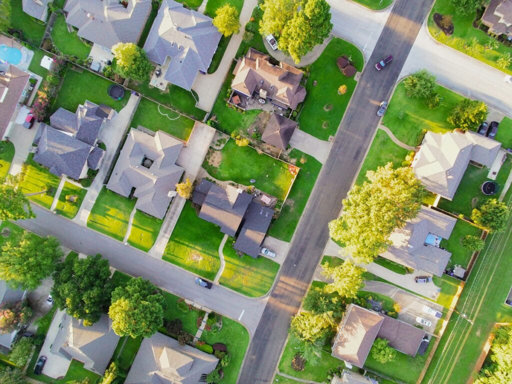 Texas Home Insurance Mitigation Discounts: What TDI’s 2026 Bulletin Means 1 Suburban homes illustrating Texas home and auto insurance coverage